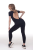 czarny kombinezon sportowy otwarte plecy długa nogawka